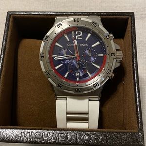 Men’s Michael Kors watch, worn once, blue face, white band. Needs a battery!!!